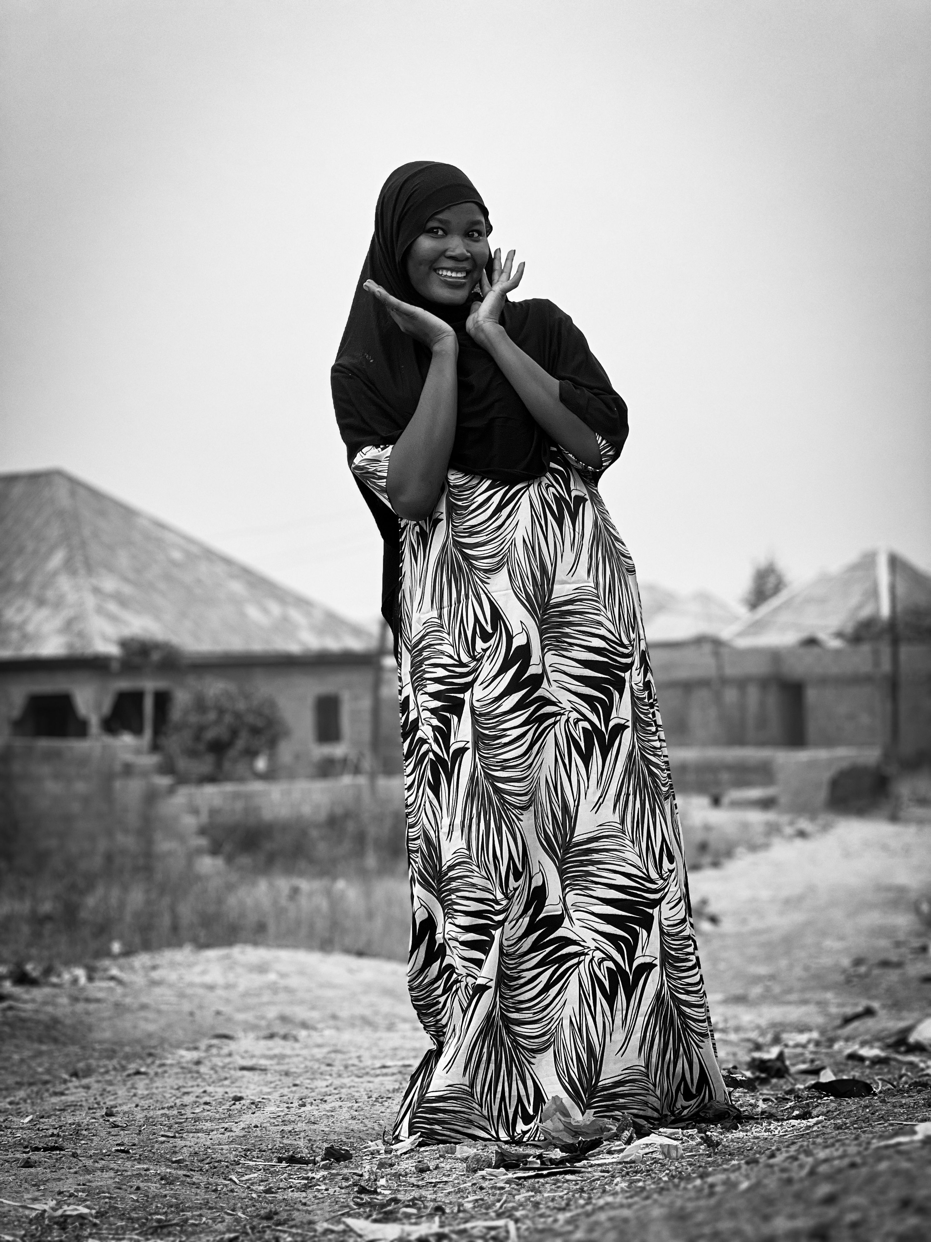 Smiling Woman in Traditional Dress Outdoors · Free Stock Photo