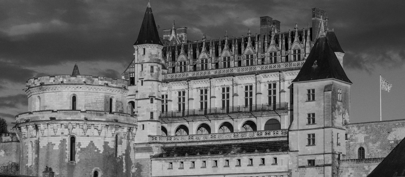 Stunning black and white photo of Château d'Amboise, showcasing its Gothic architecture.