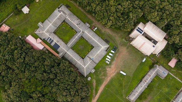 Aerial shot of buildings surrounded by greenery in Osogbo, Nigeria.