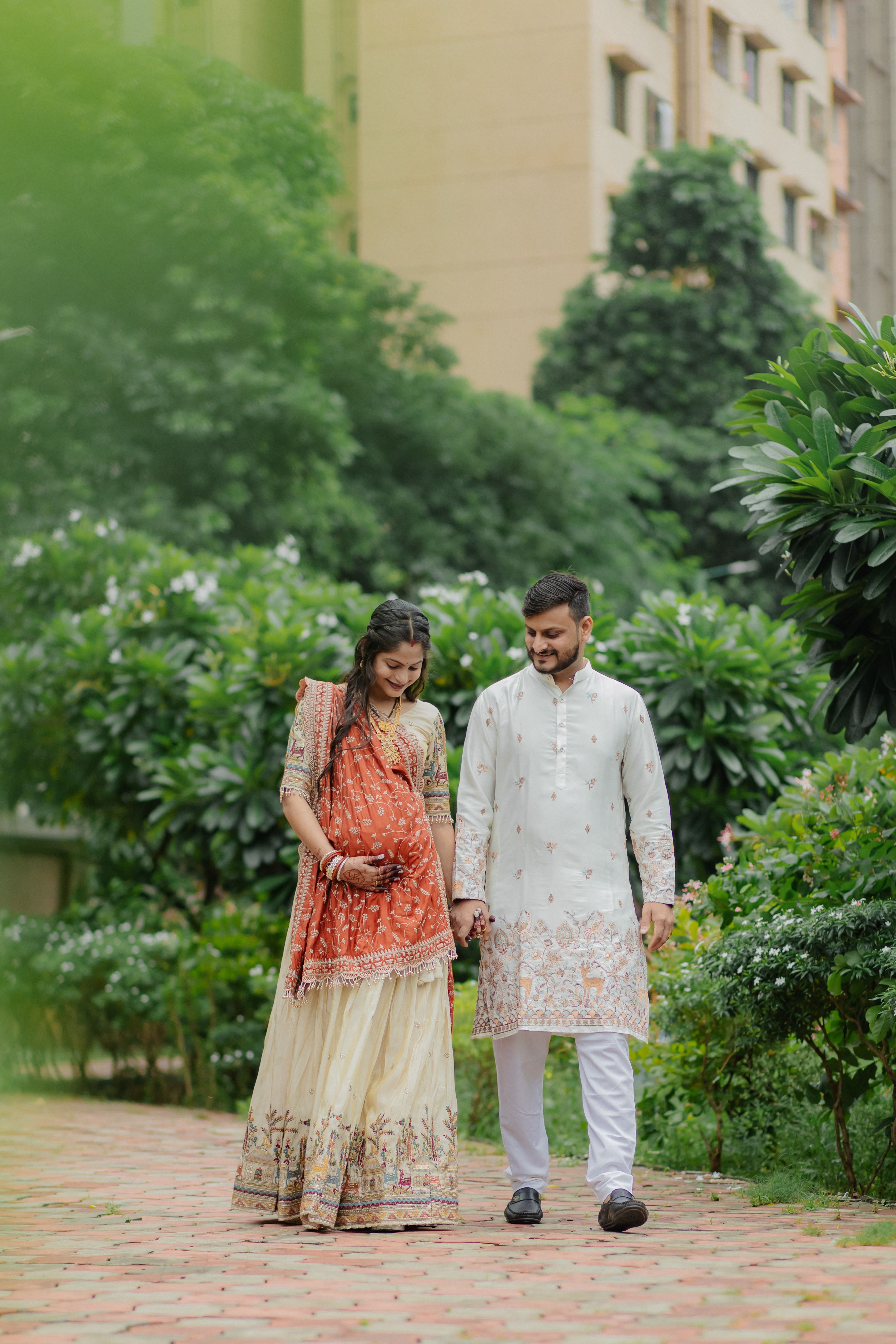 Couple in Traditional Indian Attire Outdoors · Free Stock Photo