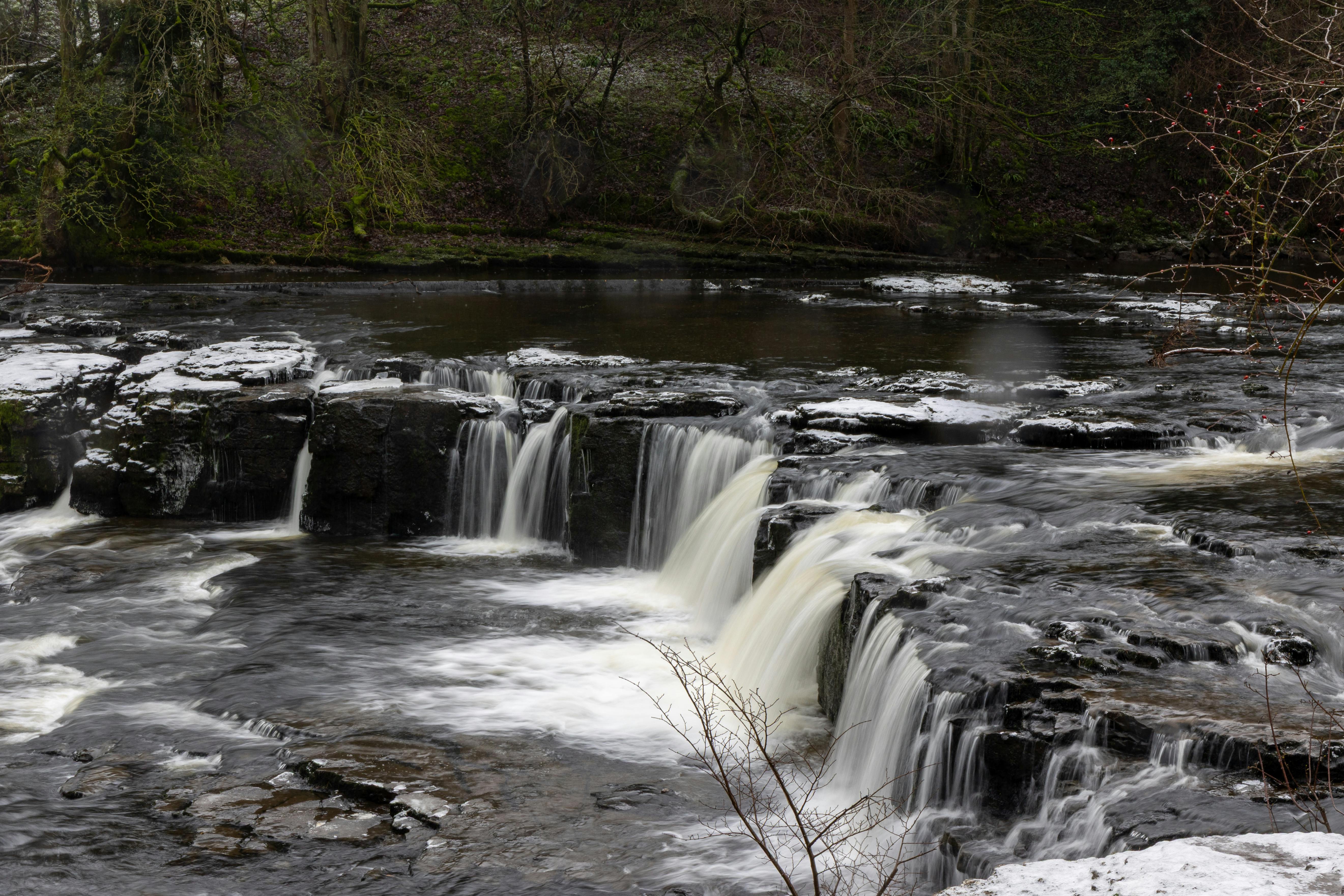 Yorkshire Dales, England waterfall and river landscape on a calm day