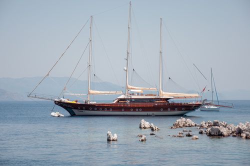 Free Elegant yacht cruising on calm waters in Marmaris with scenic views. Stock Photo