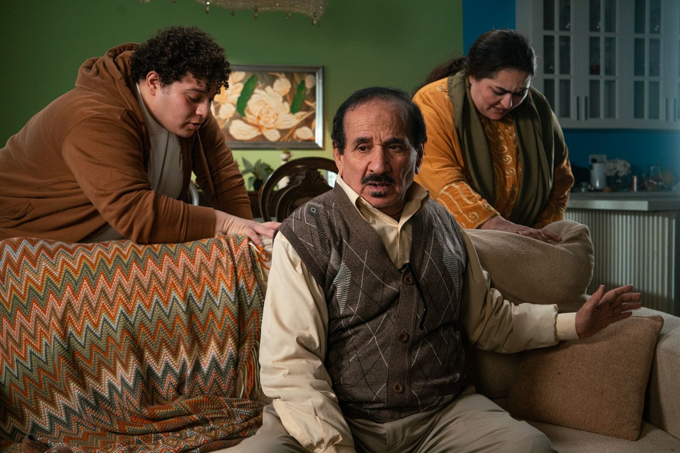 Family members having a calm conversation at home