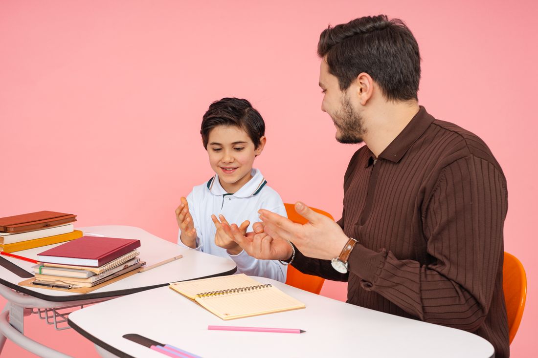 Nova Future School teacher guiding students through a technology project