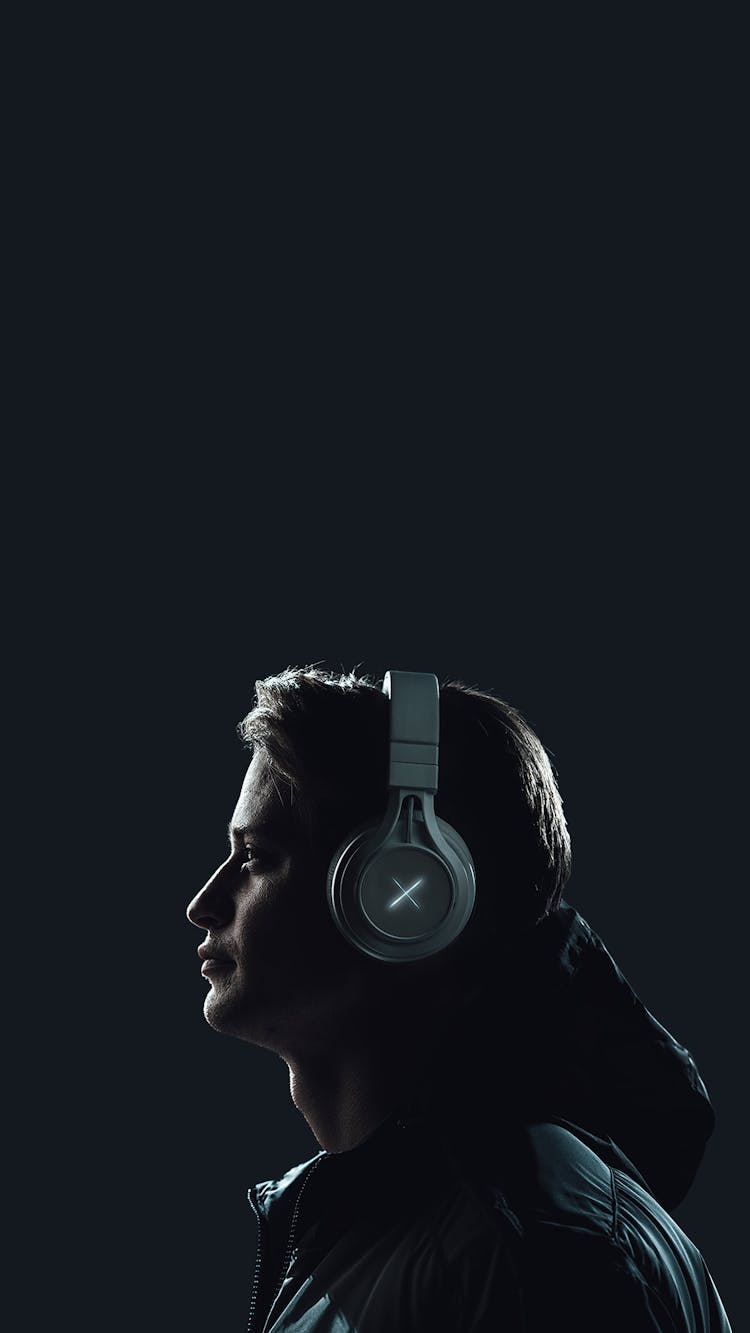 Side View Of A Man With Headphones