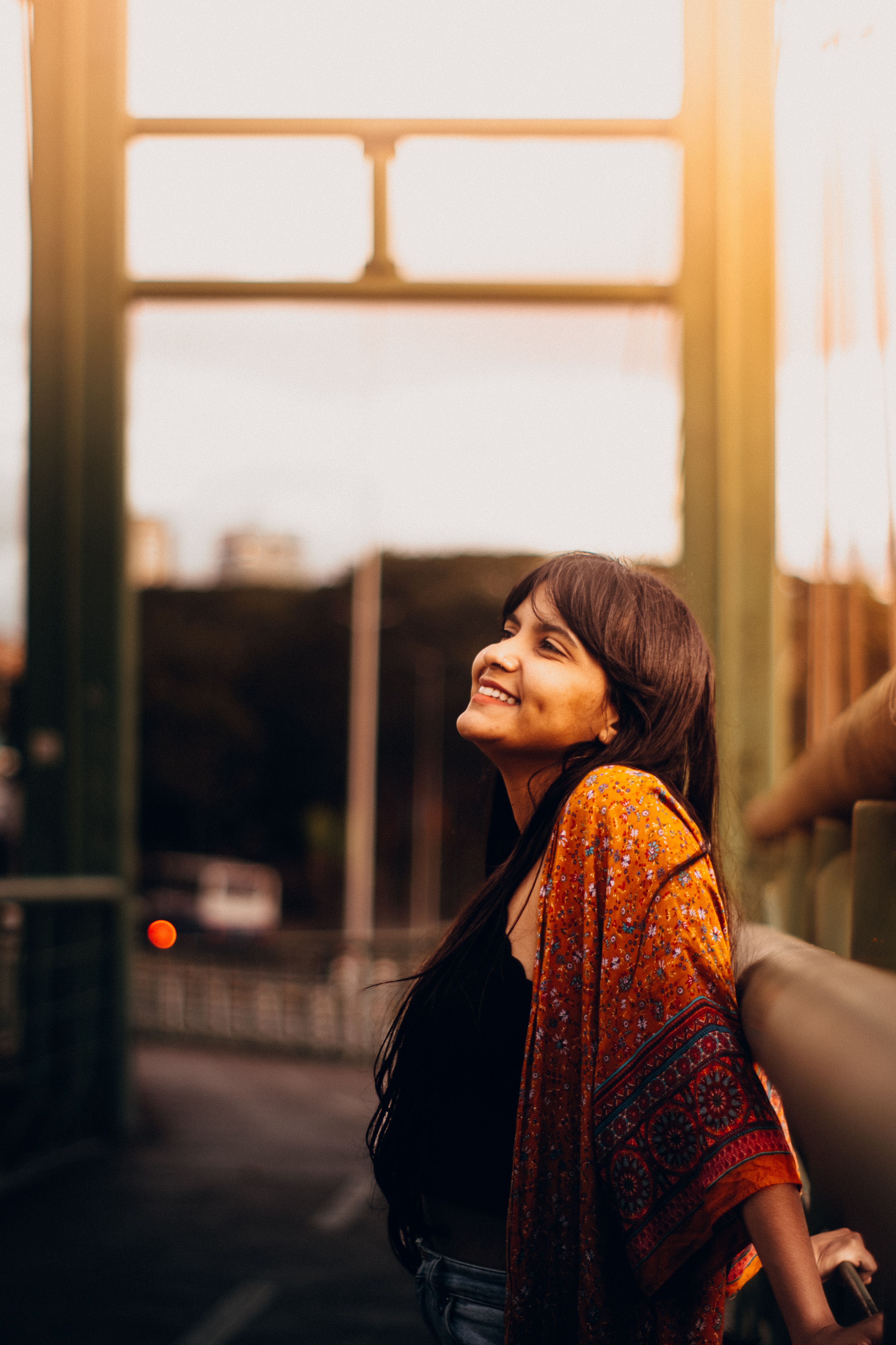 Happy Woman Enjoying Sunset Outdoors · Free Stock Photo