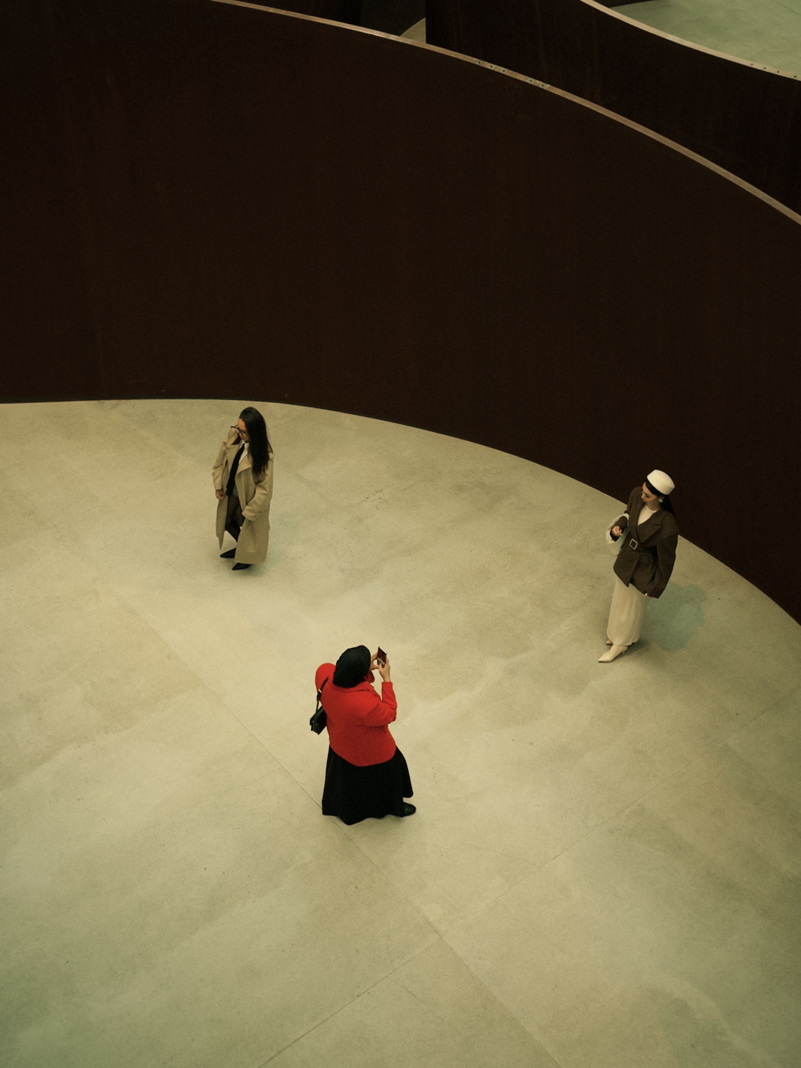 Aerial view of people in modern gallery setting · Free Stock Photo