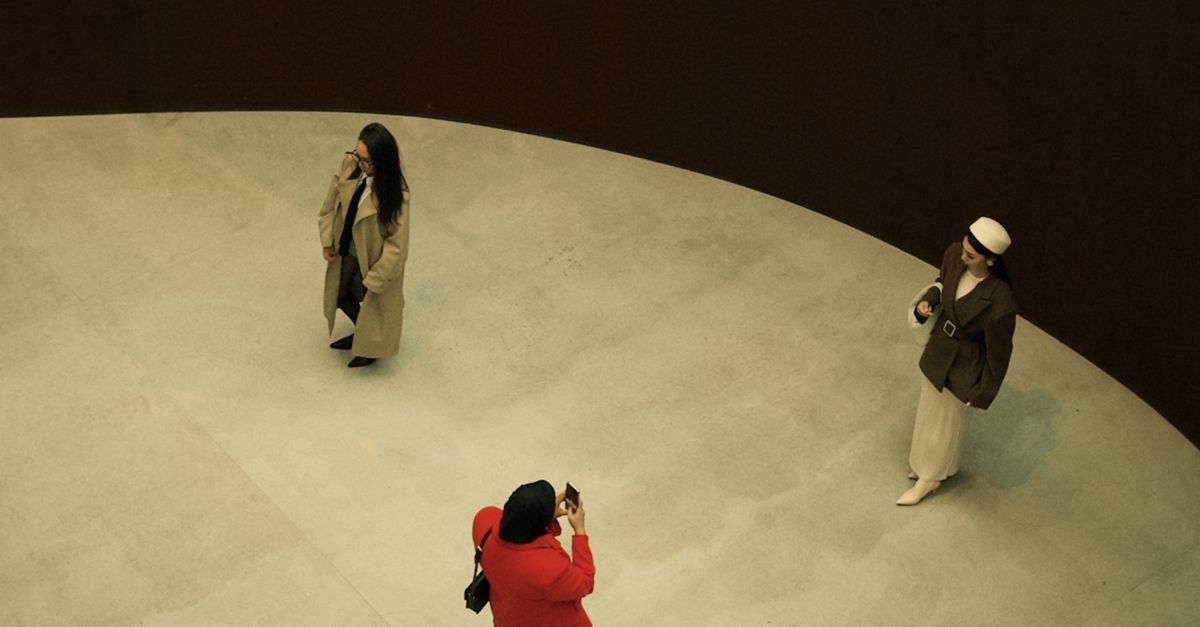Aerial view of people in modern gallery setting · Free Stock Photo