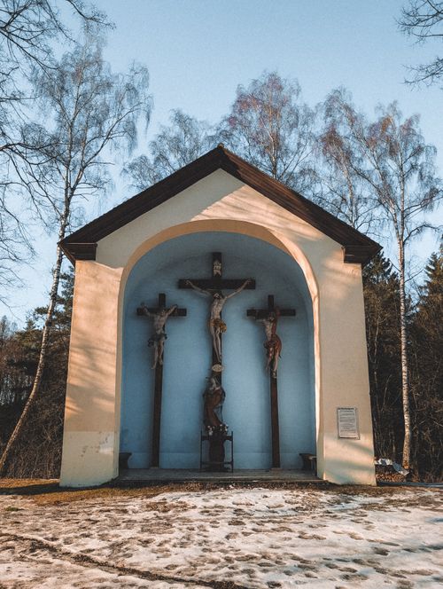 Free Chapel in Pottenstein, Bavaria with multiple crucifixes and winter setting. Stock Photo