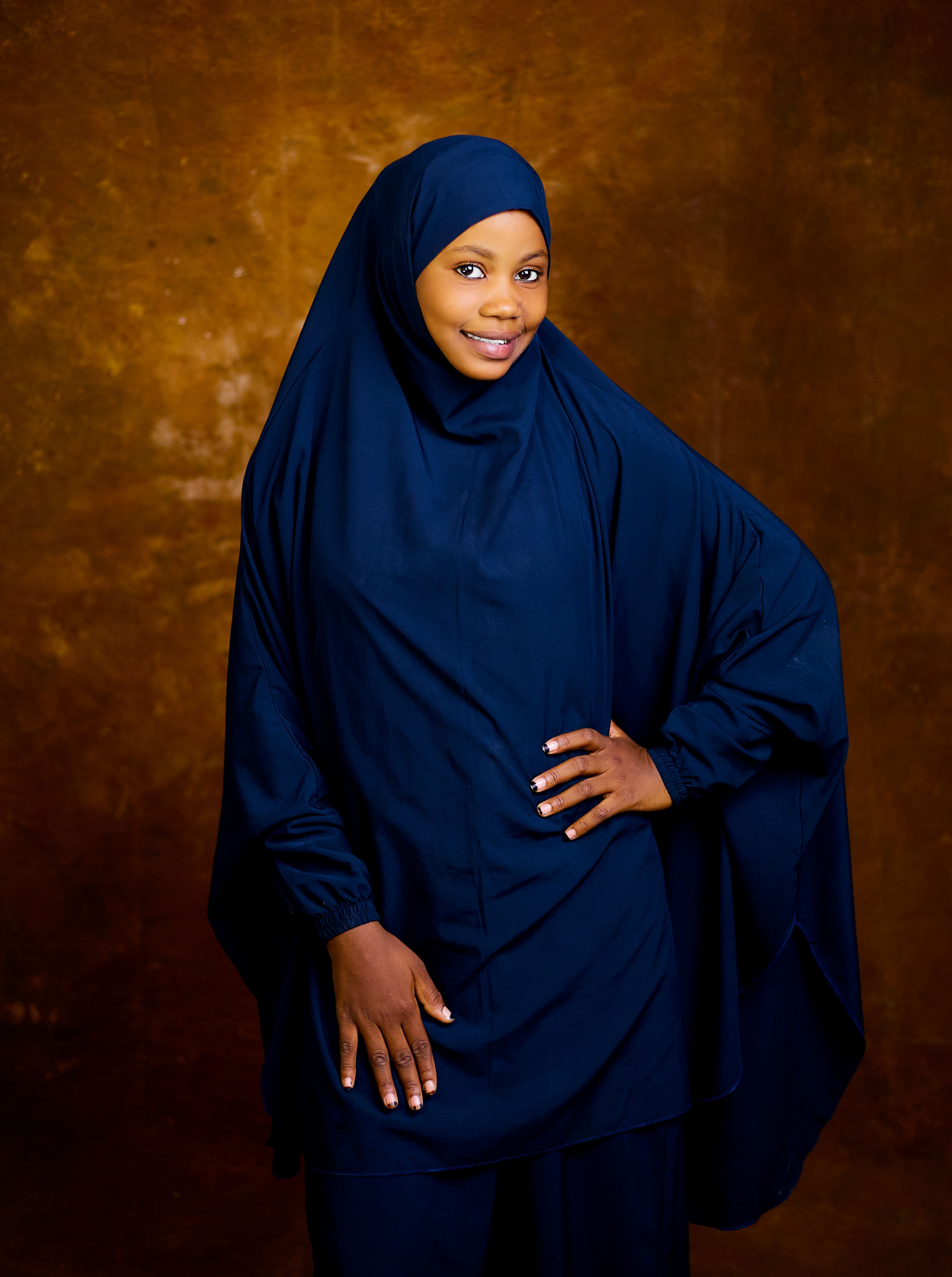 Portrait of Young Woman in Blue Hijab · Free Stock Photo