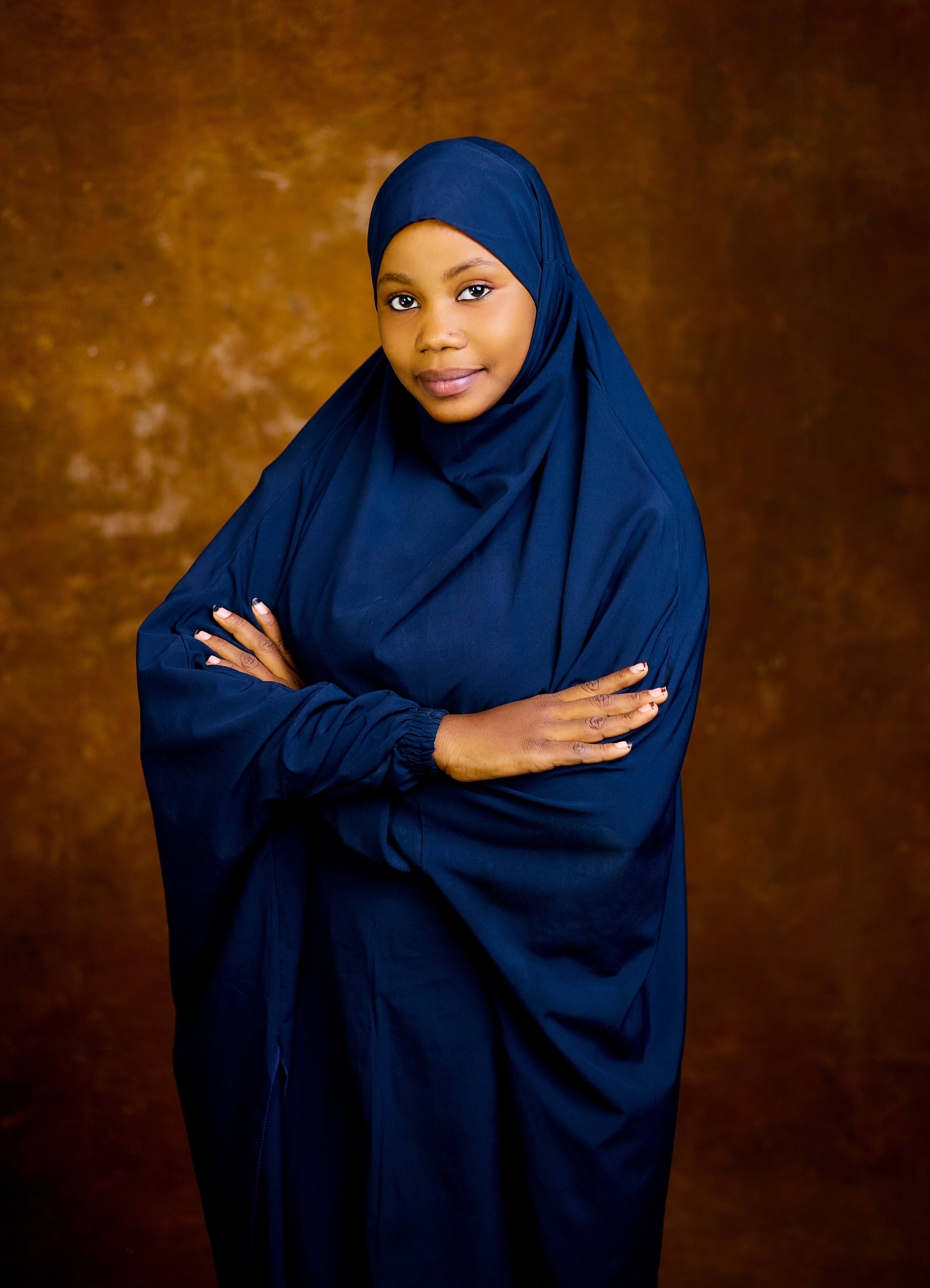 Elegant Portrait of Woman in Blue Hijab · Free Stock Photo