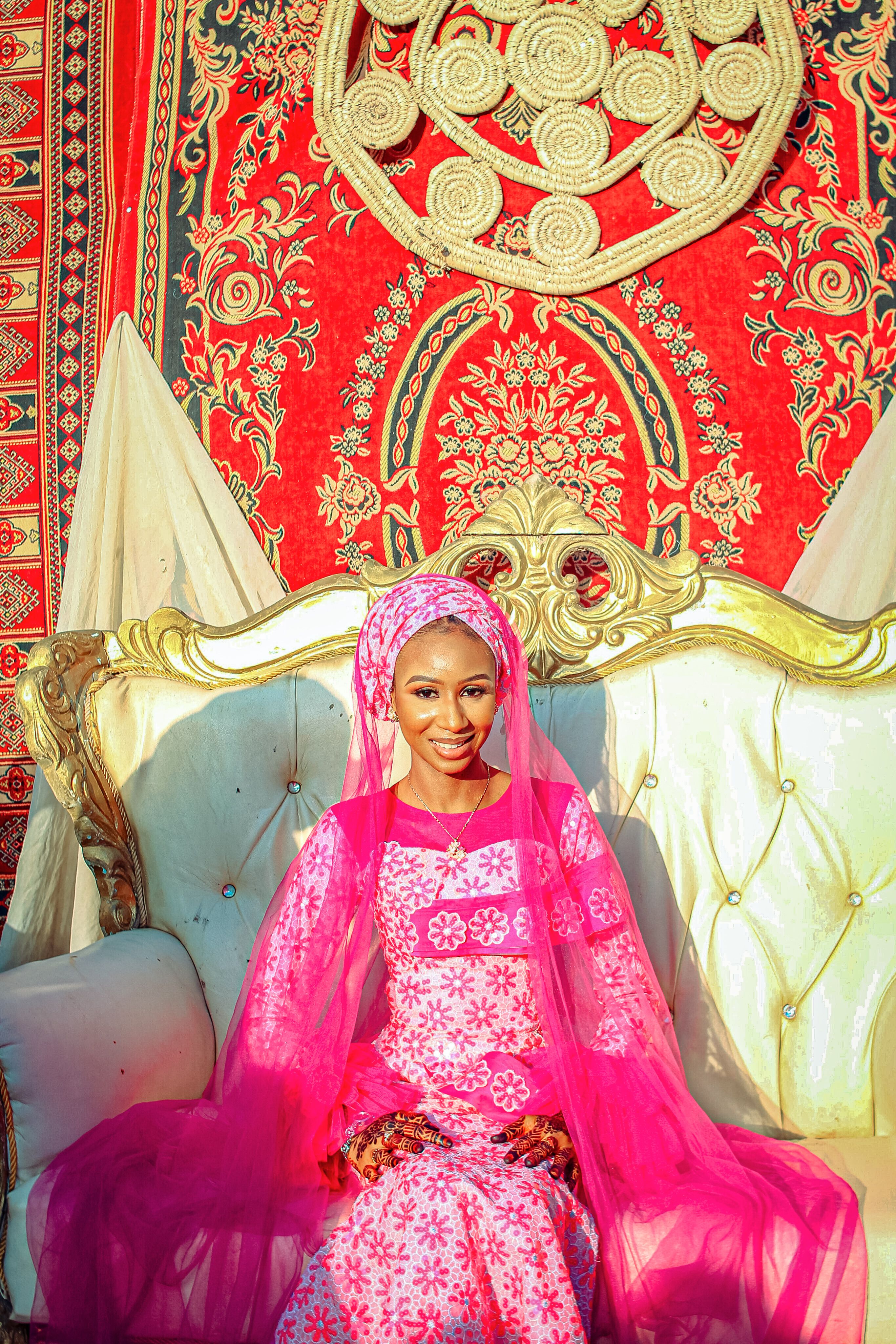 Elegant Woman in Traditional Pink Attire · Free Stock Photo