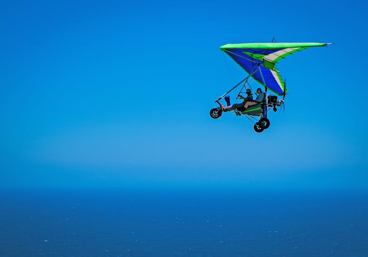 Person Riding Paraglider