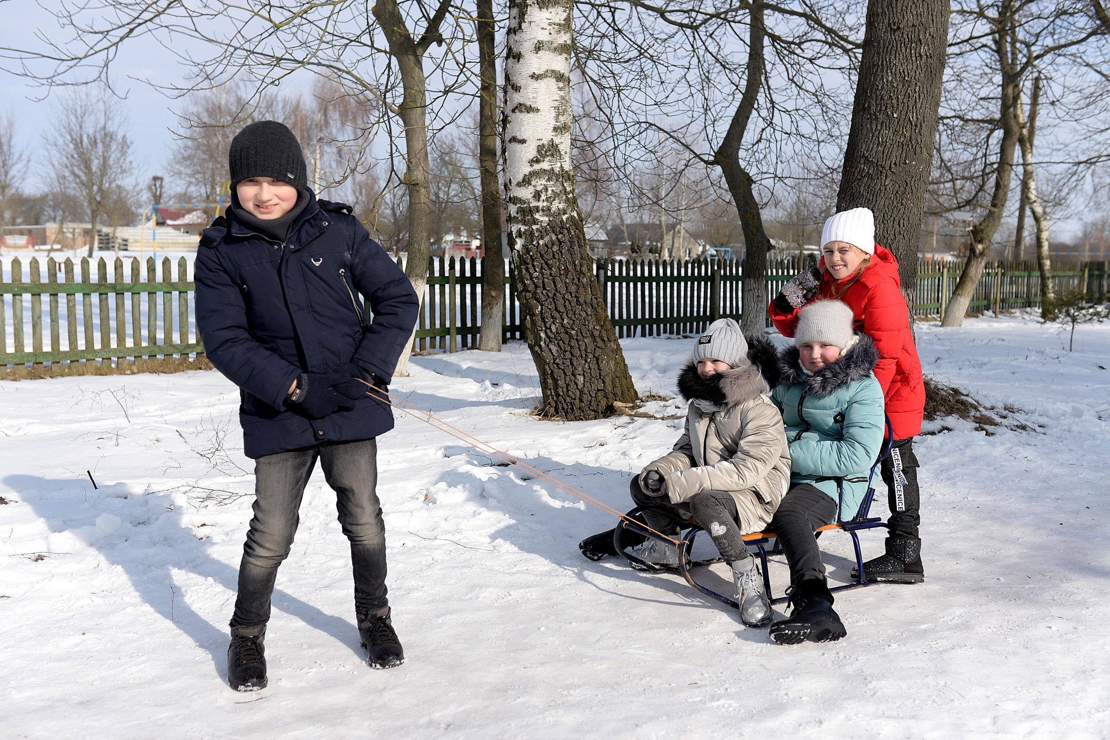 Sled Riding Images Children enjoying a sled ride in winter outdoors · Free Stock Photo