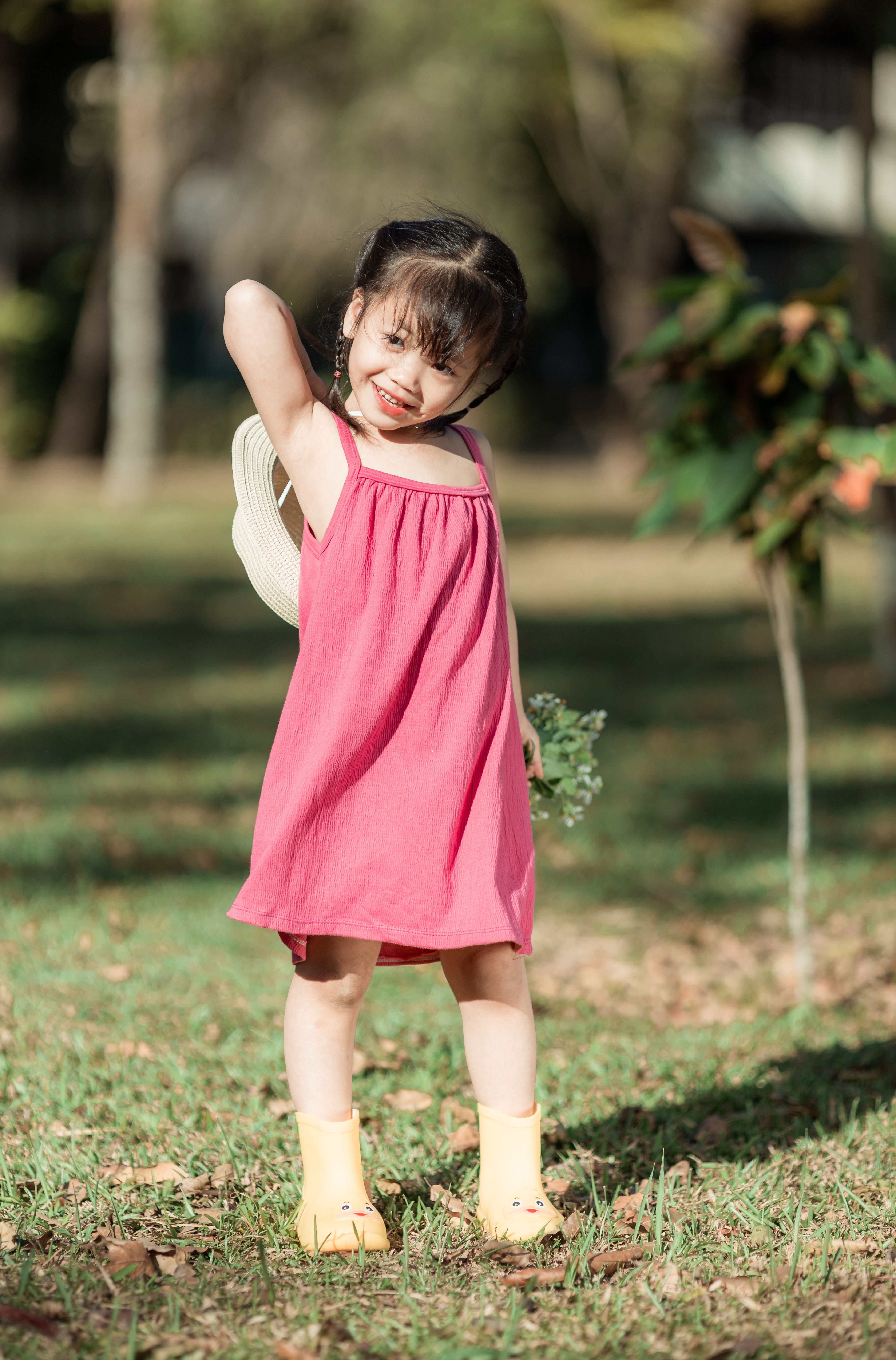 Adorable Child in Pink Dress Outdoors · Free Stock Photo