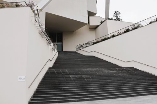 Free A contemporary staircase leading to a building entrance in Taiwan. Ideal for architecture themes. Stock Photo