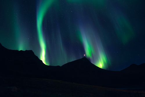 Free Capture of the vibrant Northern Lights over Myrland, Buskerud. Stock Photo