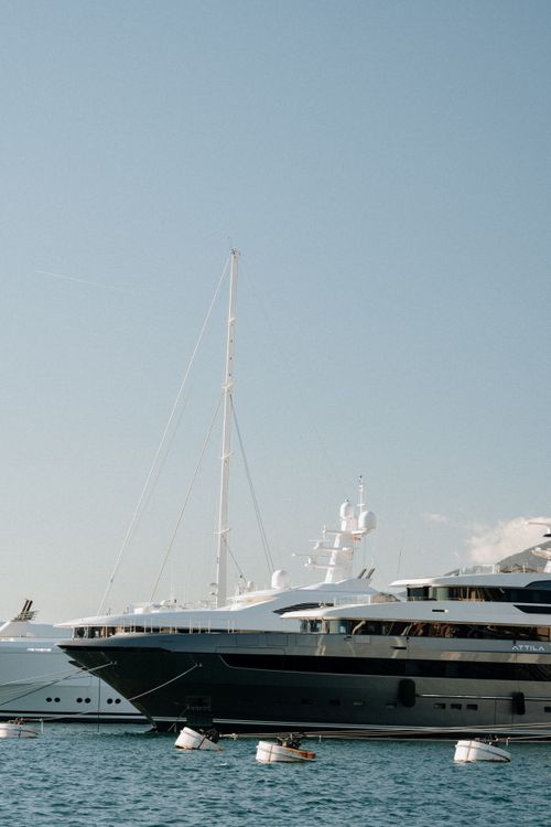Free Scenic view of luxury yachts docked in the serene harbor of Perast, Montenegro under a clear sky. Stock Photo