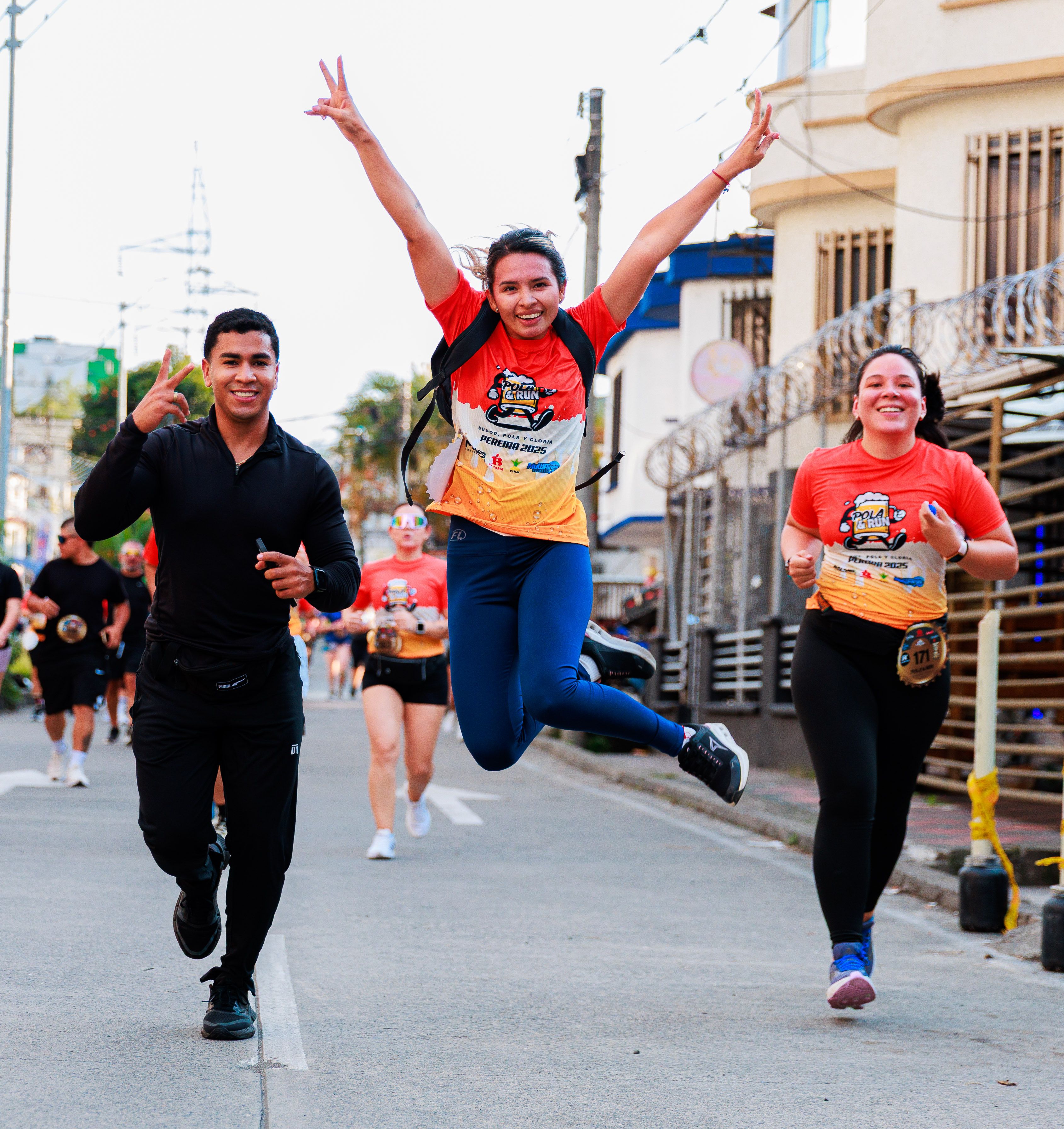 Joyful Runners Celebrating During Marathon Event · Free Stock Photo