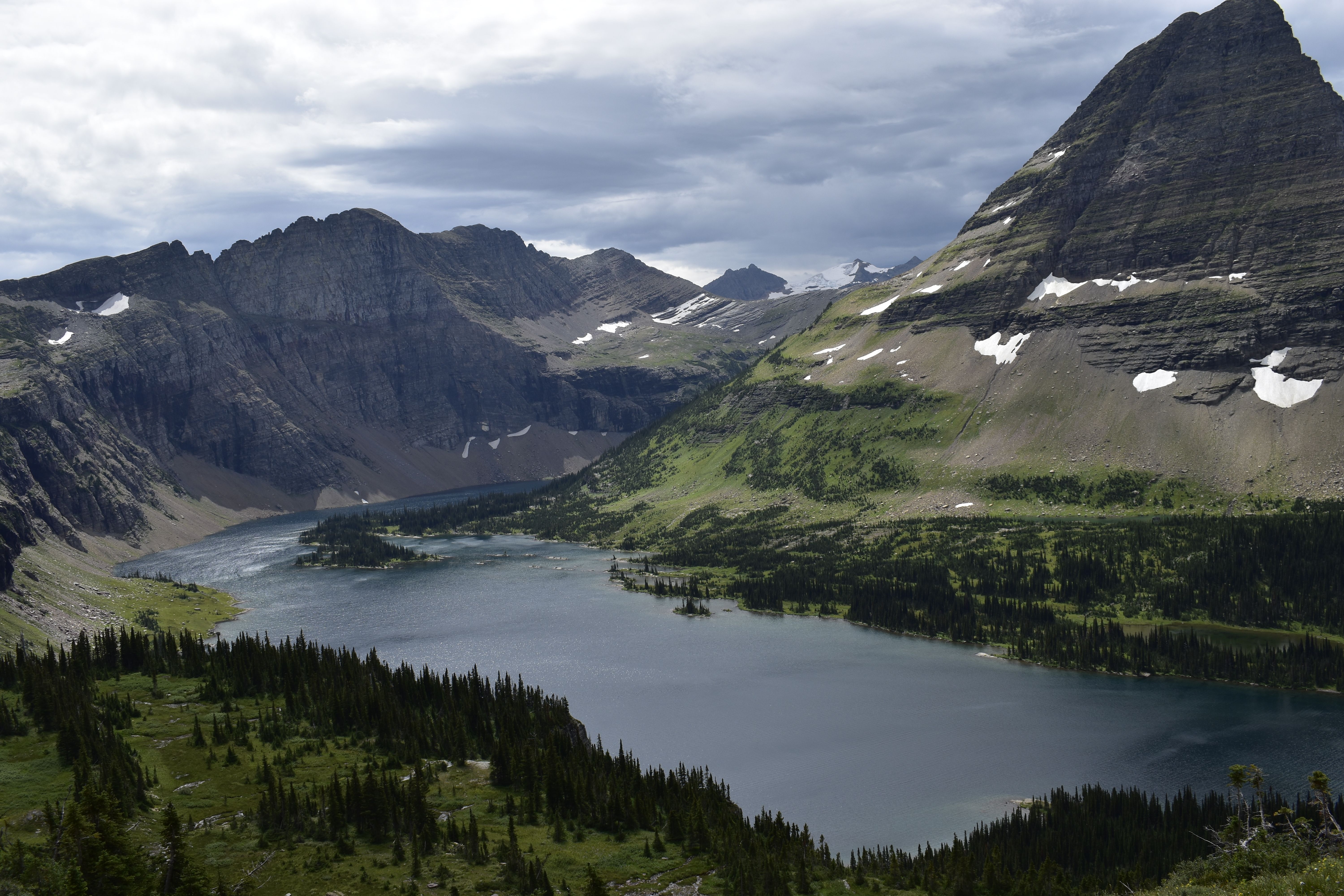 Two Medicine Lake ringed by snow-dusted peaks