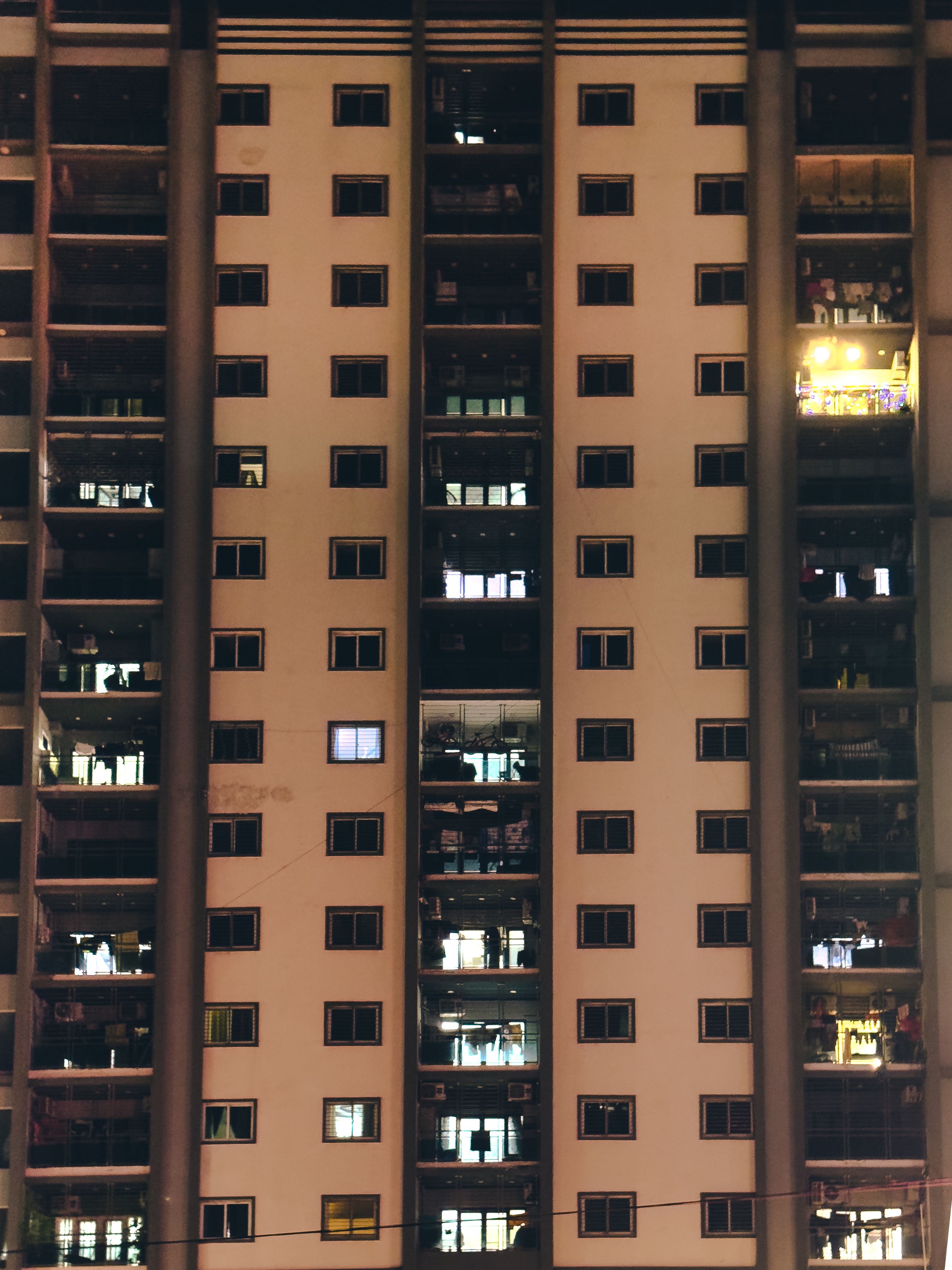 Curated visual reference: Visual Reference: Nighttime Urban High Rise Apartment Building