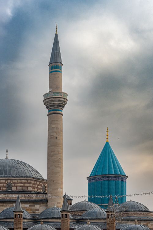 Free Scenic view of Mevlana Museum's captivating architecture under a dramatic sky at dusk. Stock Photo