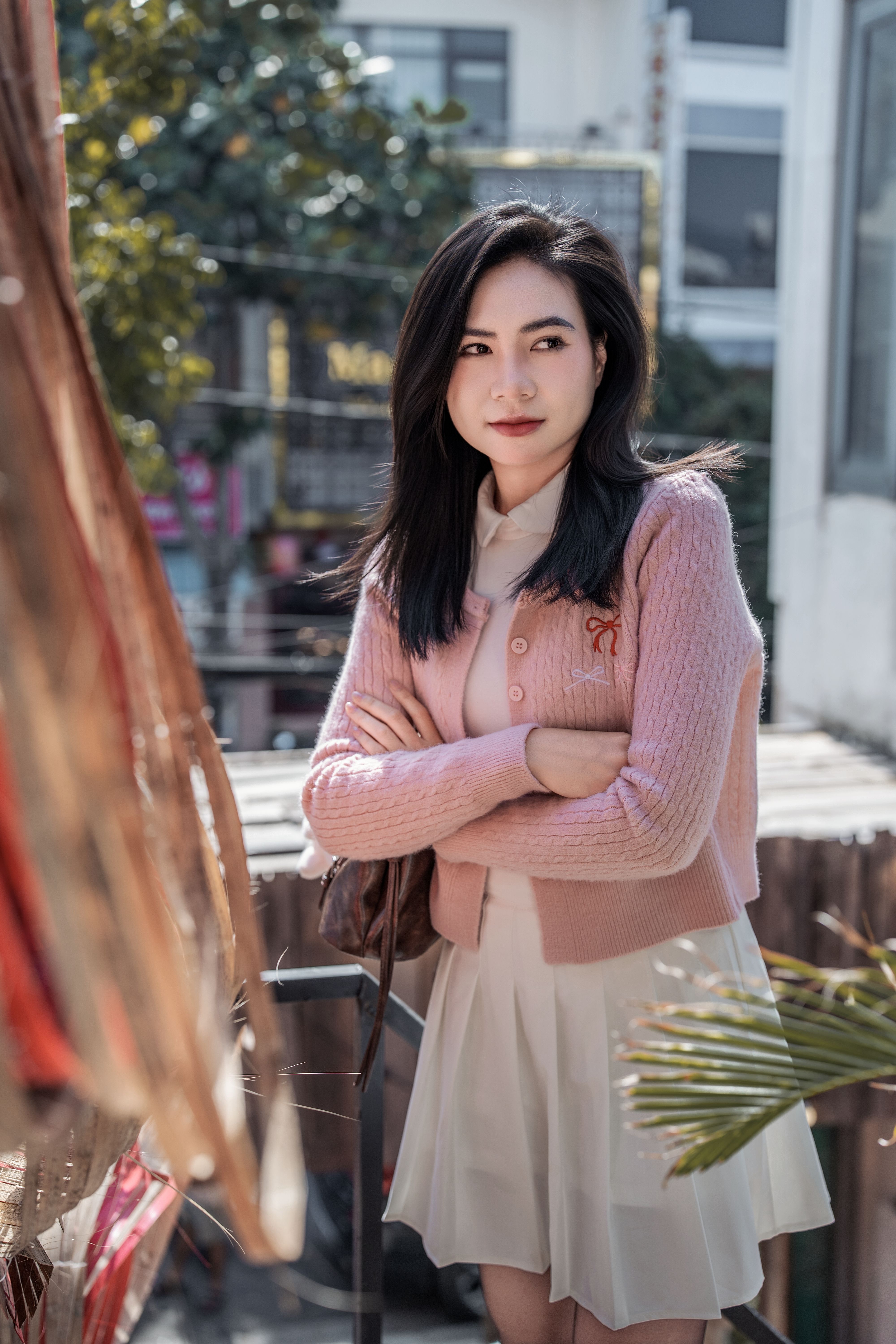 Woman in pink outfit outdoors