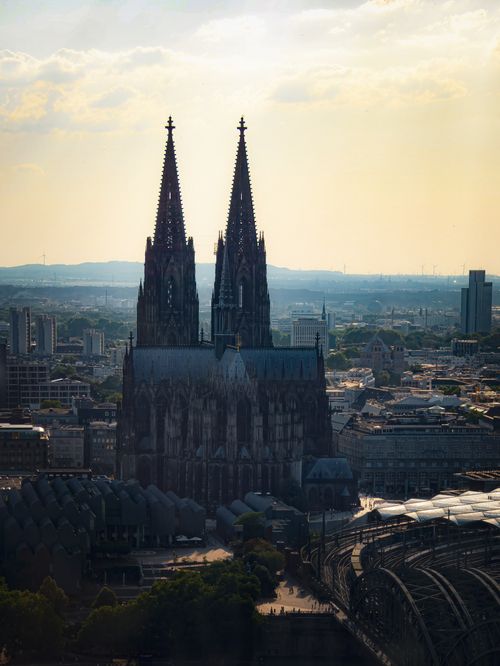 Free A stunning aerial view of Cologne Cathedral during sunset, highlighting its Gothic architecture. Stock Photo