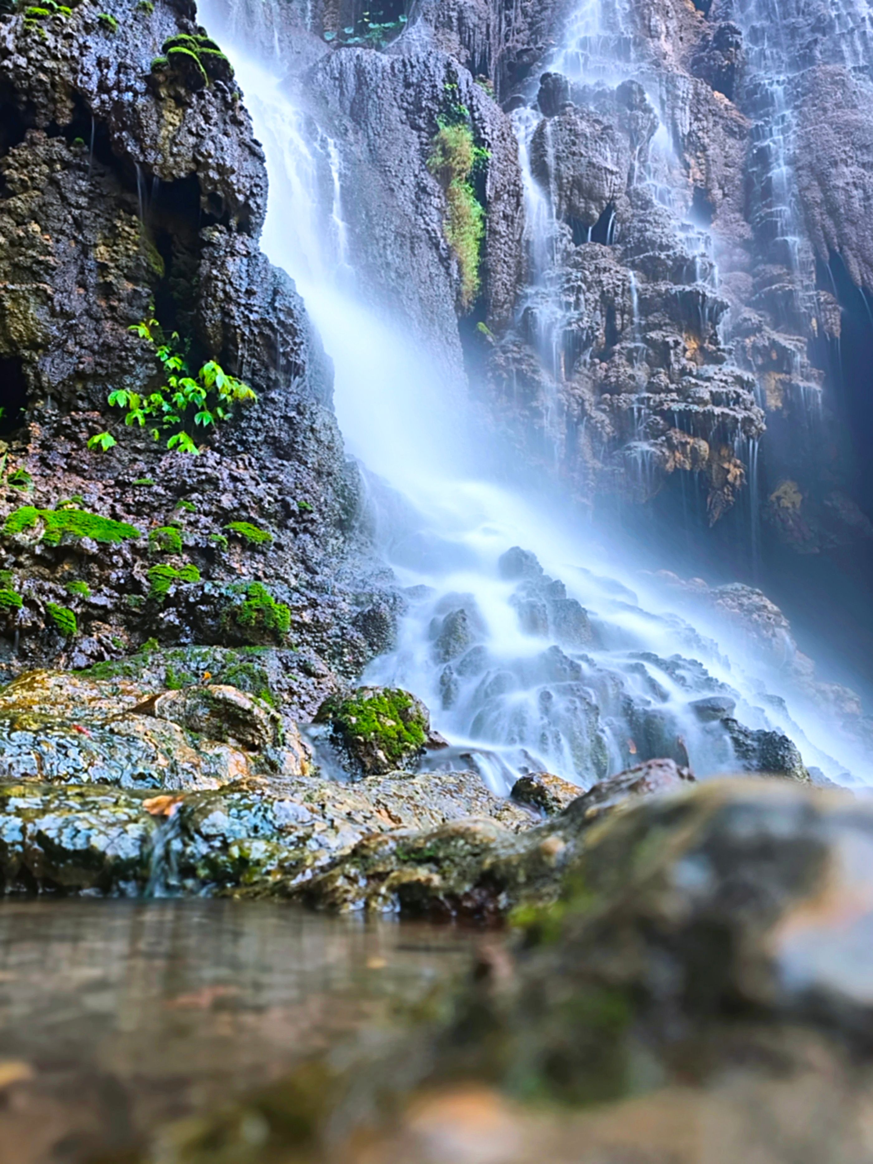 Majestic Waterfall Cascading Over Rocks · Free Stock Photo