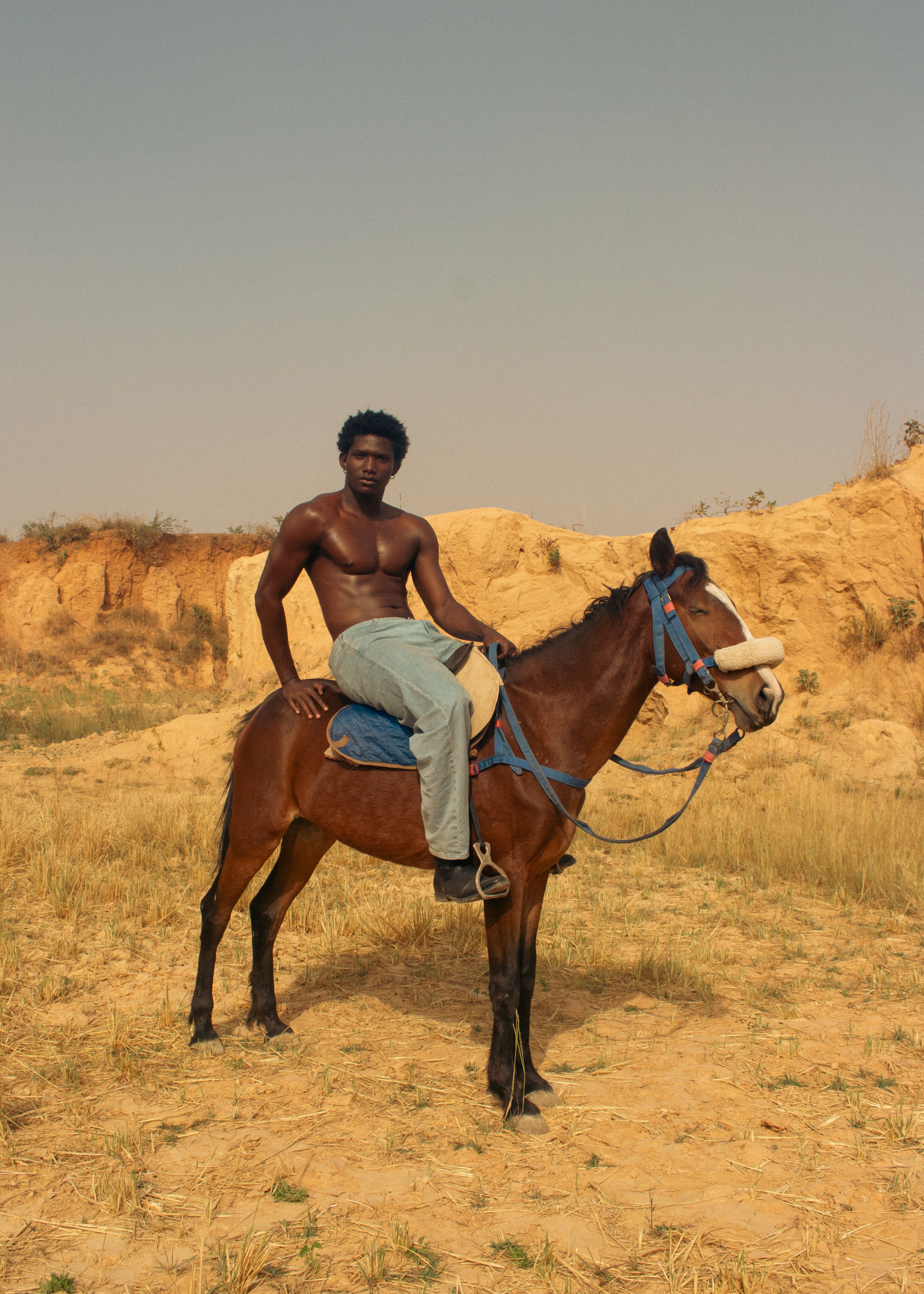 Man Riding Horse in Desert Landscape · Free Stock Photo