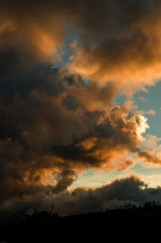 A stunning capture of dramatic clouds during sunset over Imbabura, Ecuador.