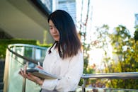 Young Professional Woman Working Outdoors in Bangkok