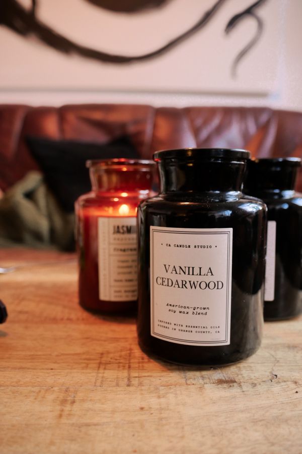 Cozy home candle on a wooden table