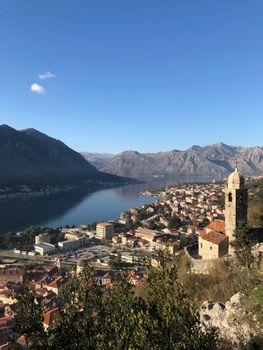 Breathtaking aerial view of Kotor Bay and the Old Town in Montenegro during daytime showcasing beautiful architecture and natural scenery.