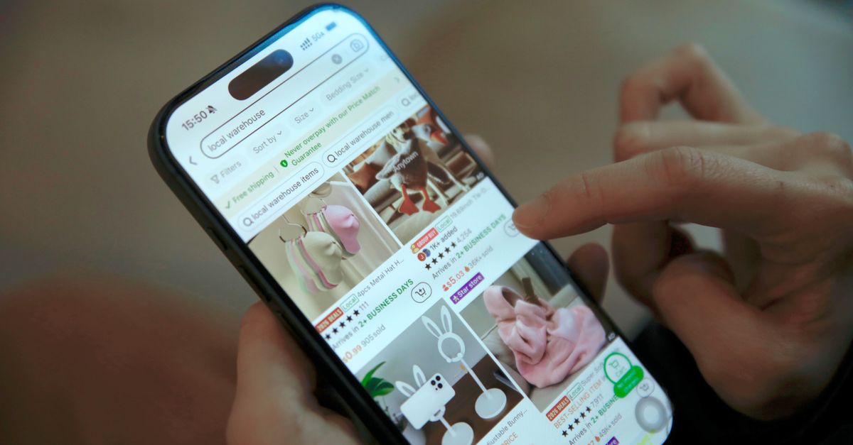 Mobile phone displaying a responsive website design.