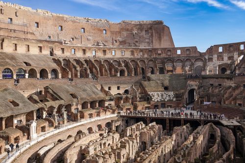 Free Explore the historic architecture of the Colosseum, showcasing ancient Roman engineering. Stock Photo