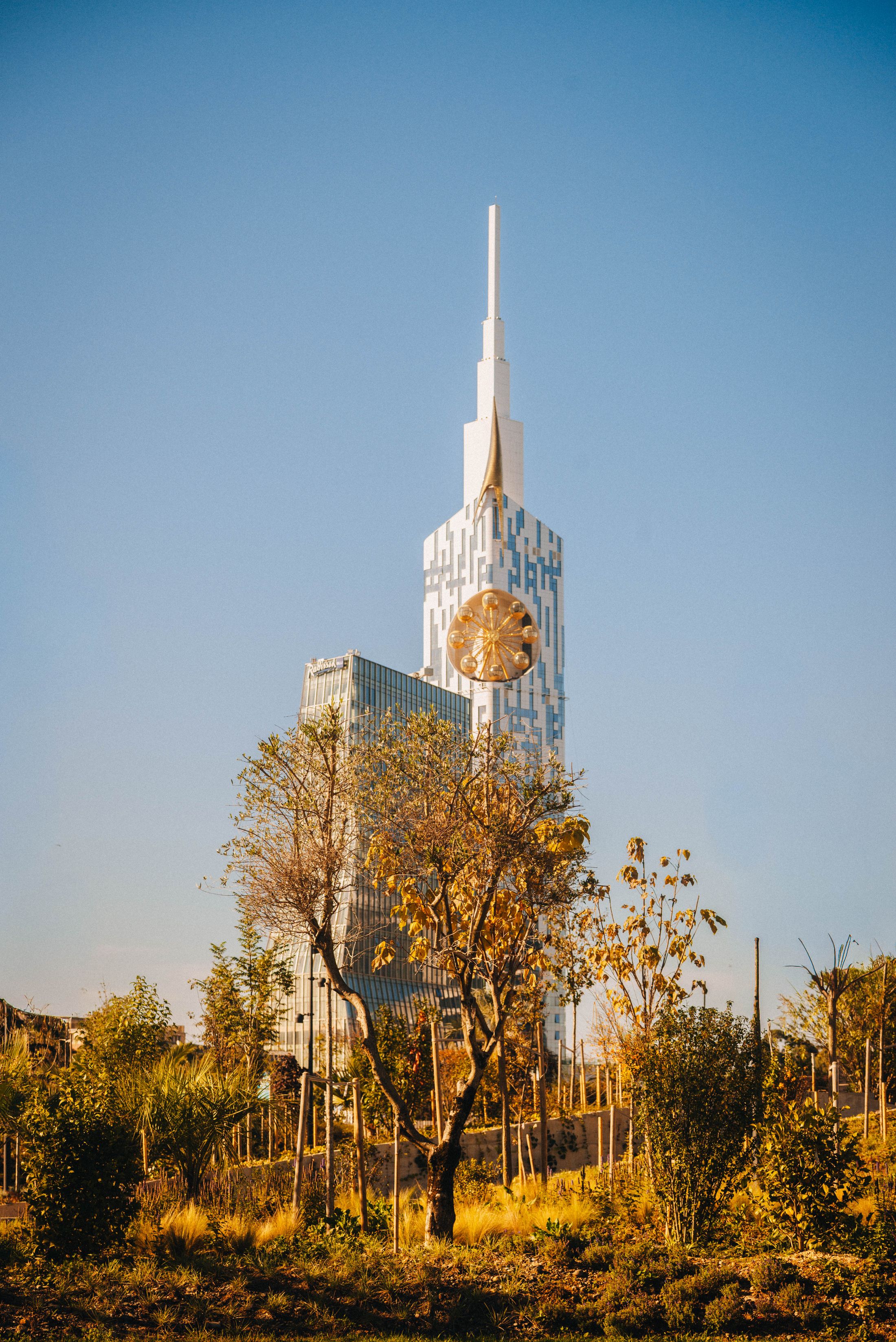 Modern Batumi tower beside an urban park