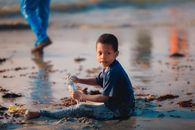 A child enjoying the sandy shores of Liido Beach, Mogadishu, Somalia.