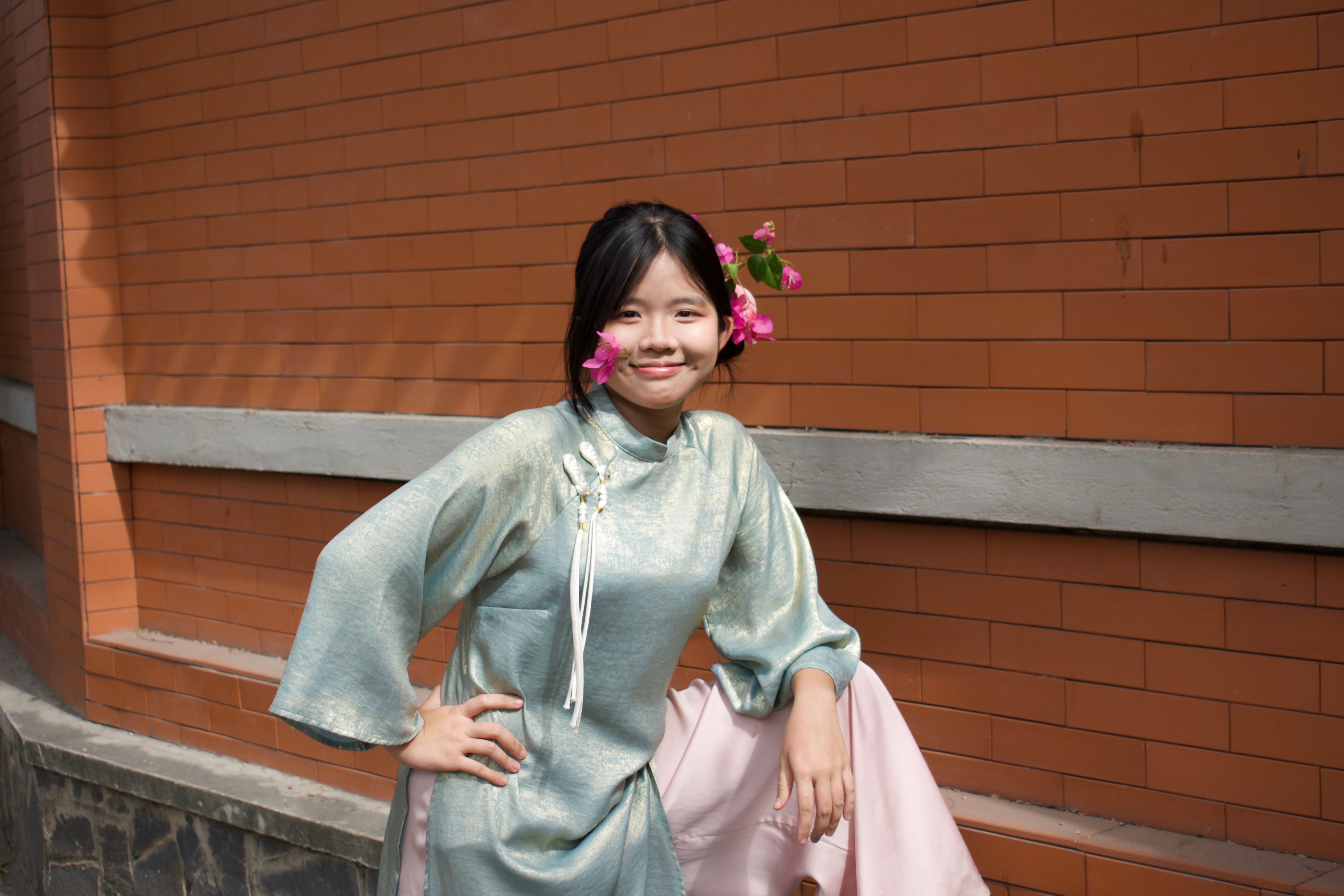 Young Woman in Traditional Dress Smiling · Free Stock Photo