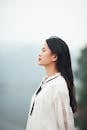 Serene Side Profile of Woman Outdoors