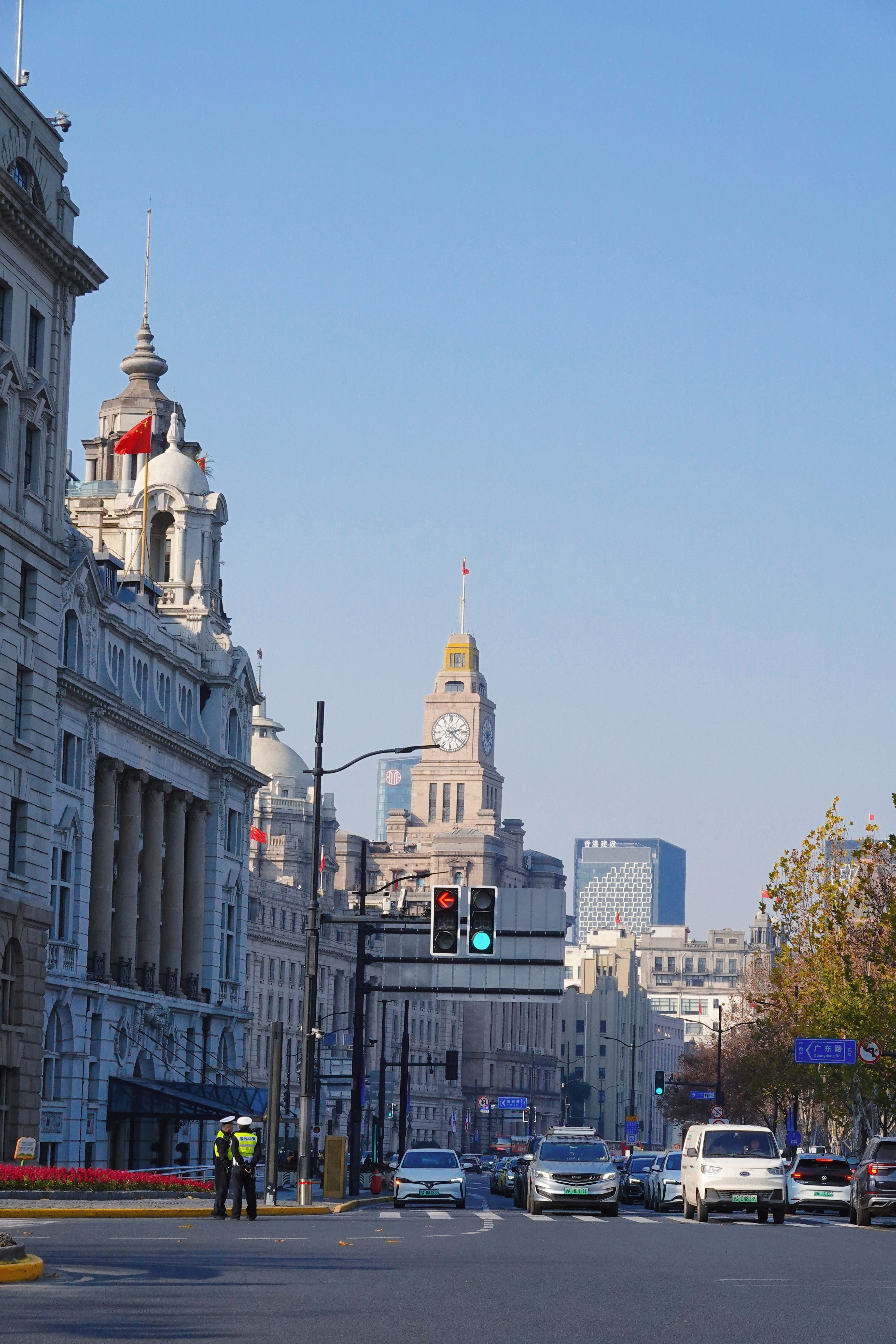 Shanghai Custom House clock tower and colonial-era buildings along the Bund by day