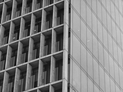 Free A striking black and white view of a modern building's facade in Santiago, Chile. Stock Photo