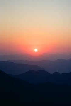 Beautiful sunrise over mountain ranges at Cuatro Palos, Querétaro. Serene and breathtaking view.