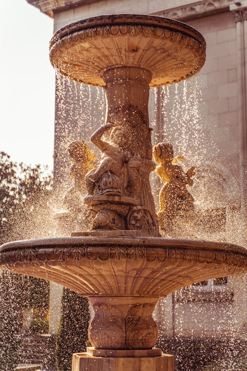 Free Water Fountain With Water Fountain in the Middle Stock Photo