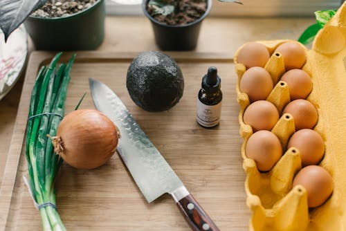 Silver Knife Beside Poultry Eggs