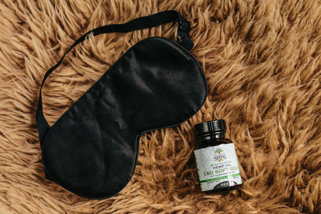 Photo of Hemp Oil Bottle and Eye Mask