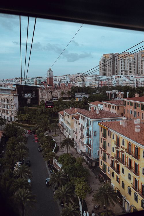 Free Scenic aerial view of colorful city buildings and cable car in Phu Quoc, Vietnam. Stock Photo
