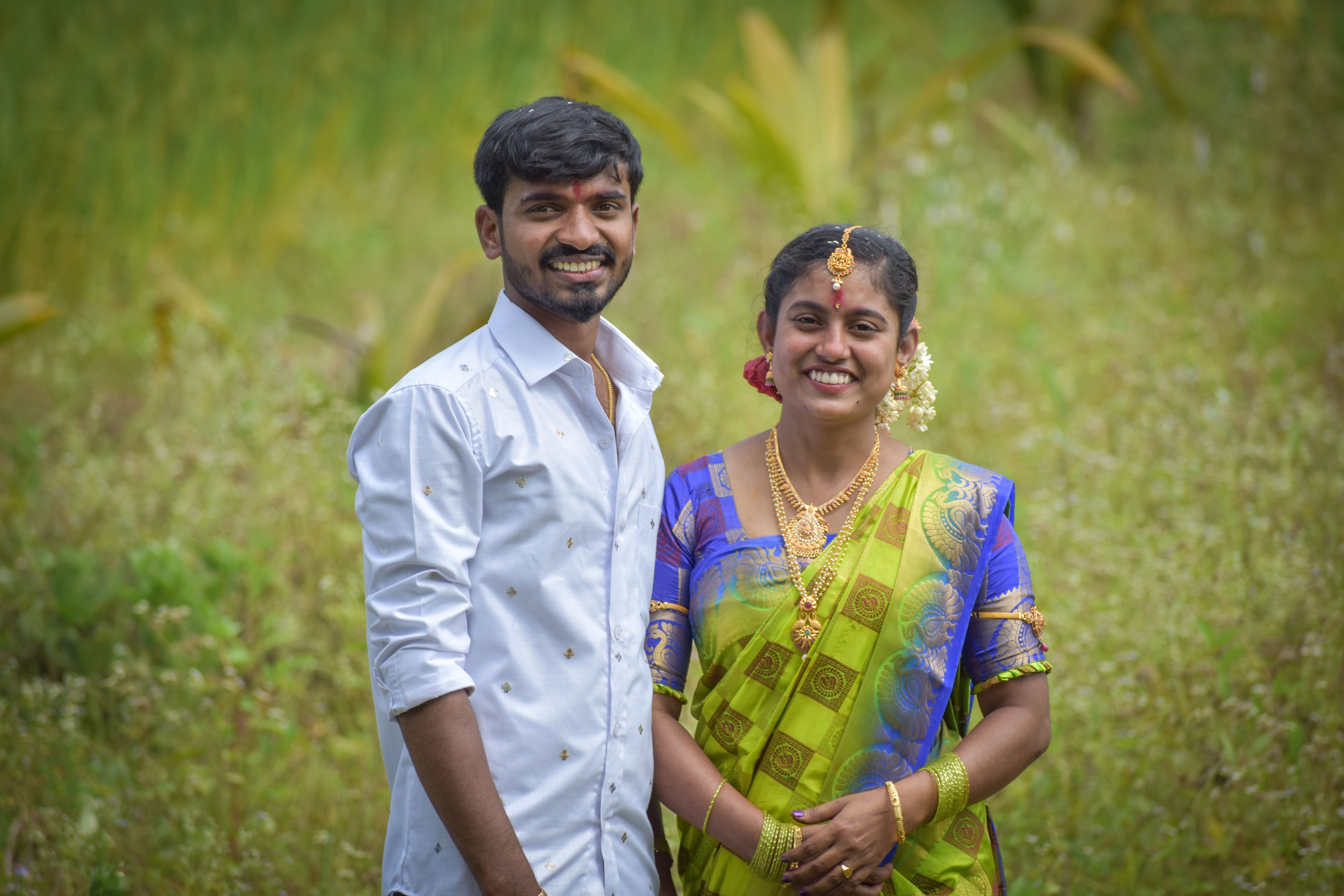 Joyful Couple in Traditional Indian Attire · Free Stock Photo