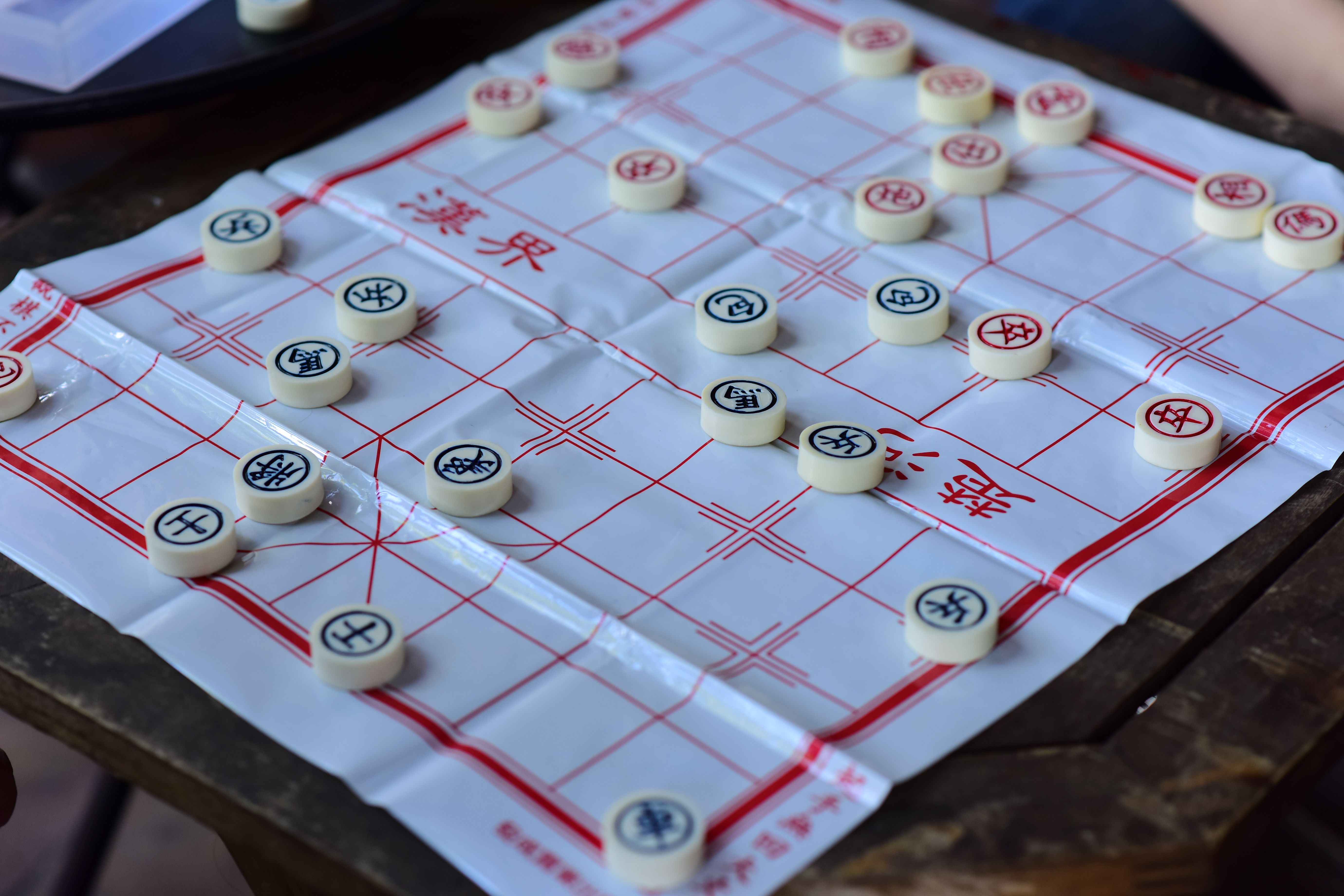 Traditional Xiangqi Chess Game Setup Outdoors · Free Stock Photo