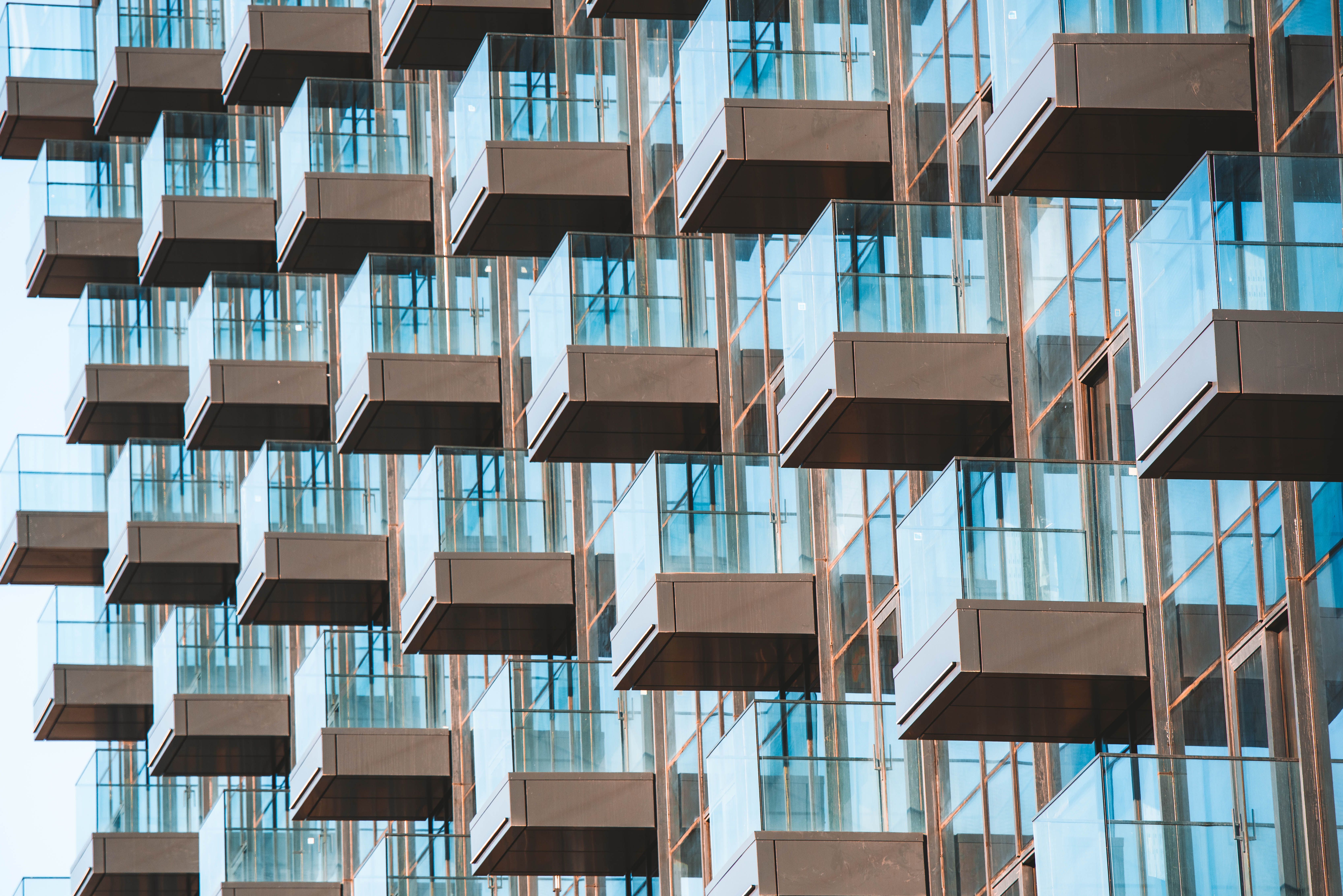 Curated visual reference: Urban High Rise Apartments With Balcony Reference: Modern Glass Balconies On Urban High Rise